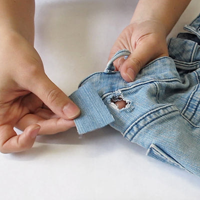 Réparer le trou d'un jean - La Fabrique éthique